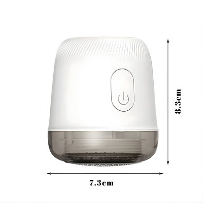 Biały Fuzora™ z Inicala.pl z wymiarami 8.3 cm × 7.3 cm – kompaktowy trymer do tkanin o minimalistycznym designie.