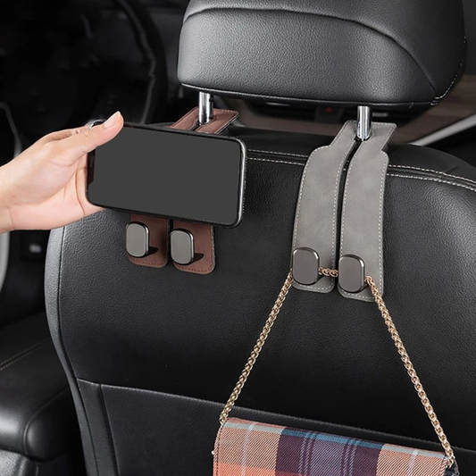 HangEase Organizer z Inicala.pl – szary i brązowy wieszak na zagłówku, używany jednocześnie jako uchwyt na telefon i elegancki wieszak na torebkę