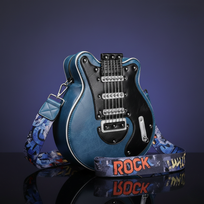 Niebieska Guitarista™ – Torebka Crossbody w kształcie gitary z czarnym frontem i paskiem ROCK, połyskująca na ciemnofioletowym tle, dostępna w Inicala.pl
