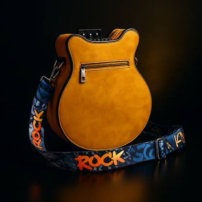 Torebka Guitarista™ z Inicala.pl w żółtym kolorze, widok od tyłu z kieszenią i szerokim paskiem „ROCK”. Wyrazisty akcent łączący styl i funkcjonalność.