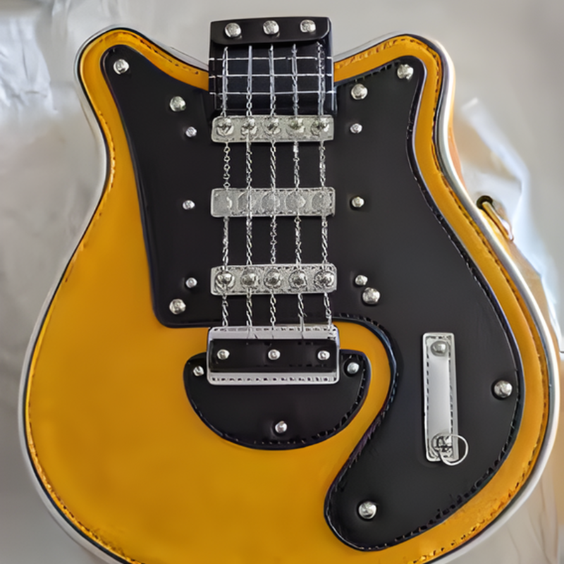 Zolta Guitarista Torebka Crossbody z czarnym frontem gitary i srebrnymi zdobieniami pokazana z bliska na jasnym tle produkt Inicala.pl